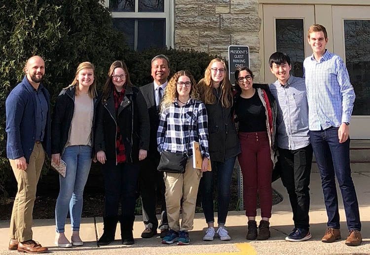 Dr. Yudha and students at Wheaton conference