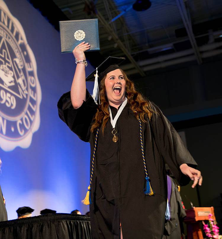 Graduate excited for diploma