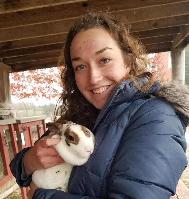 SPED 420 student holding bunny