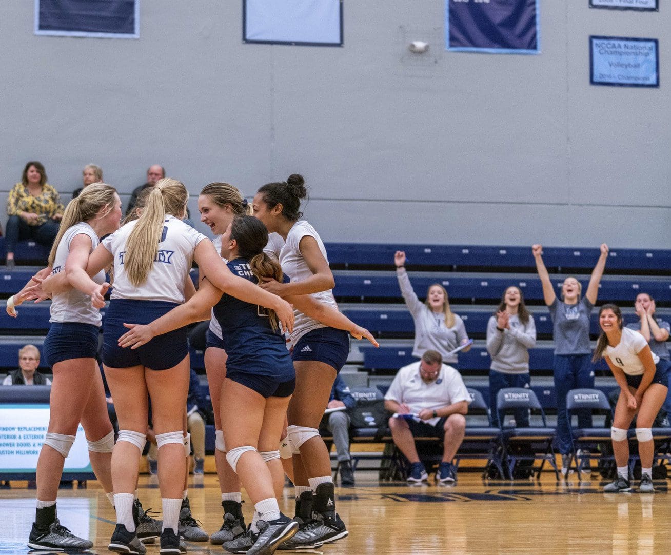 Volleyball team in huddle