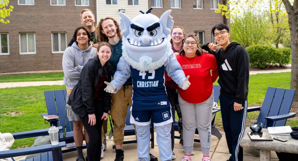 Students with the Trinity Troll mascot