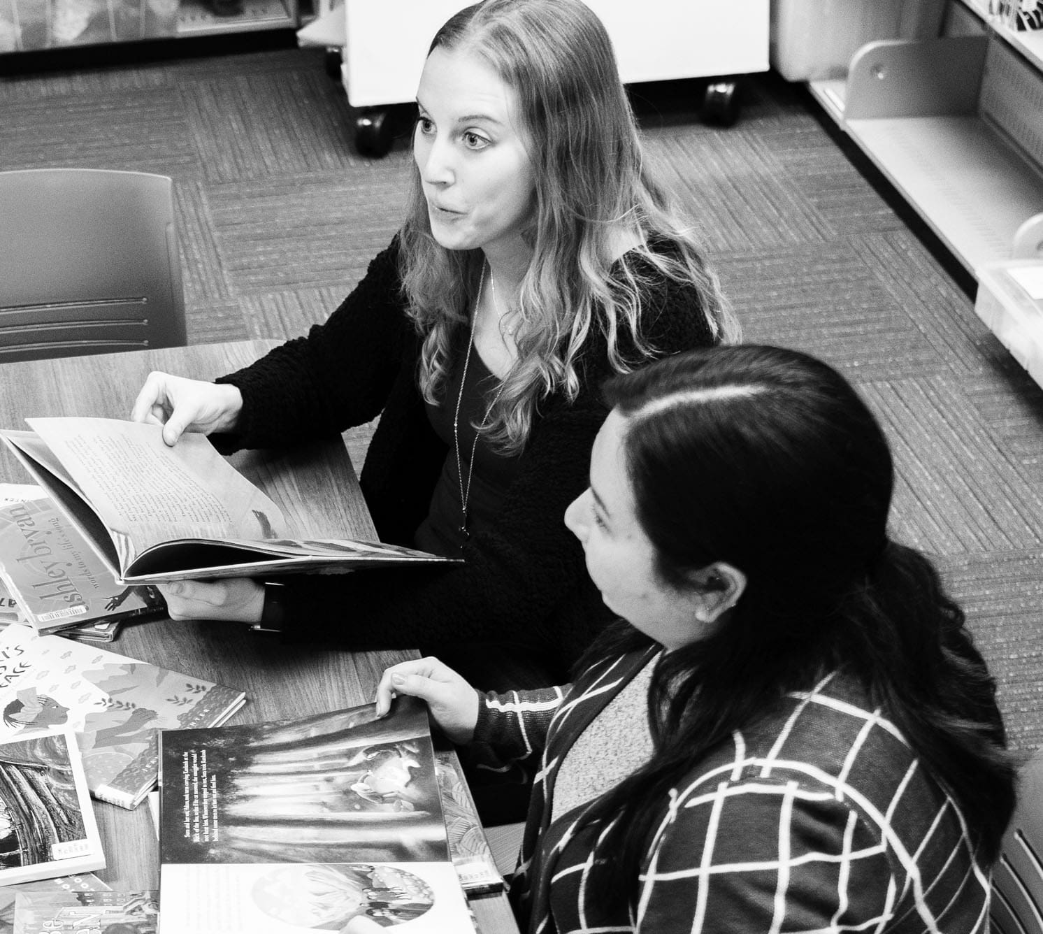 Graduate students going over Children's literature
