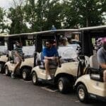 Golfers in golf carts