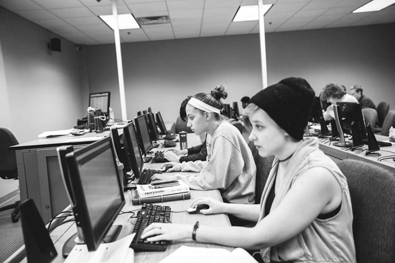 Students studying on computers
