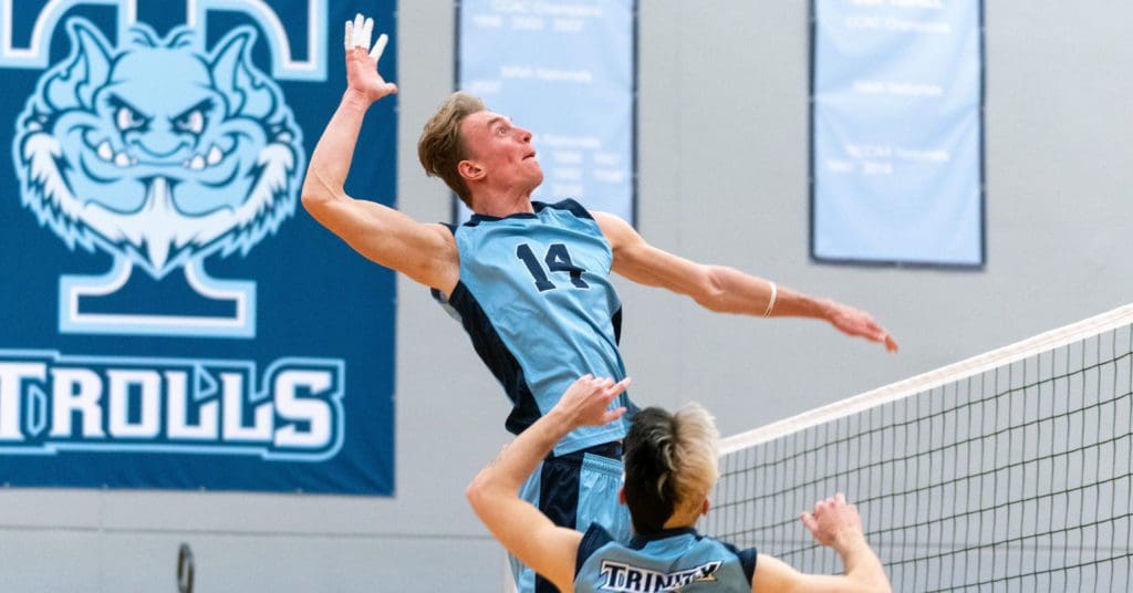 men's volleyball - player jumping up for a spike