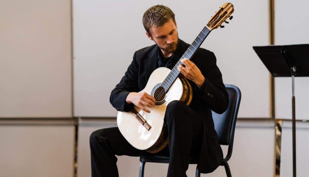 Kevin Brown playing the guitar