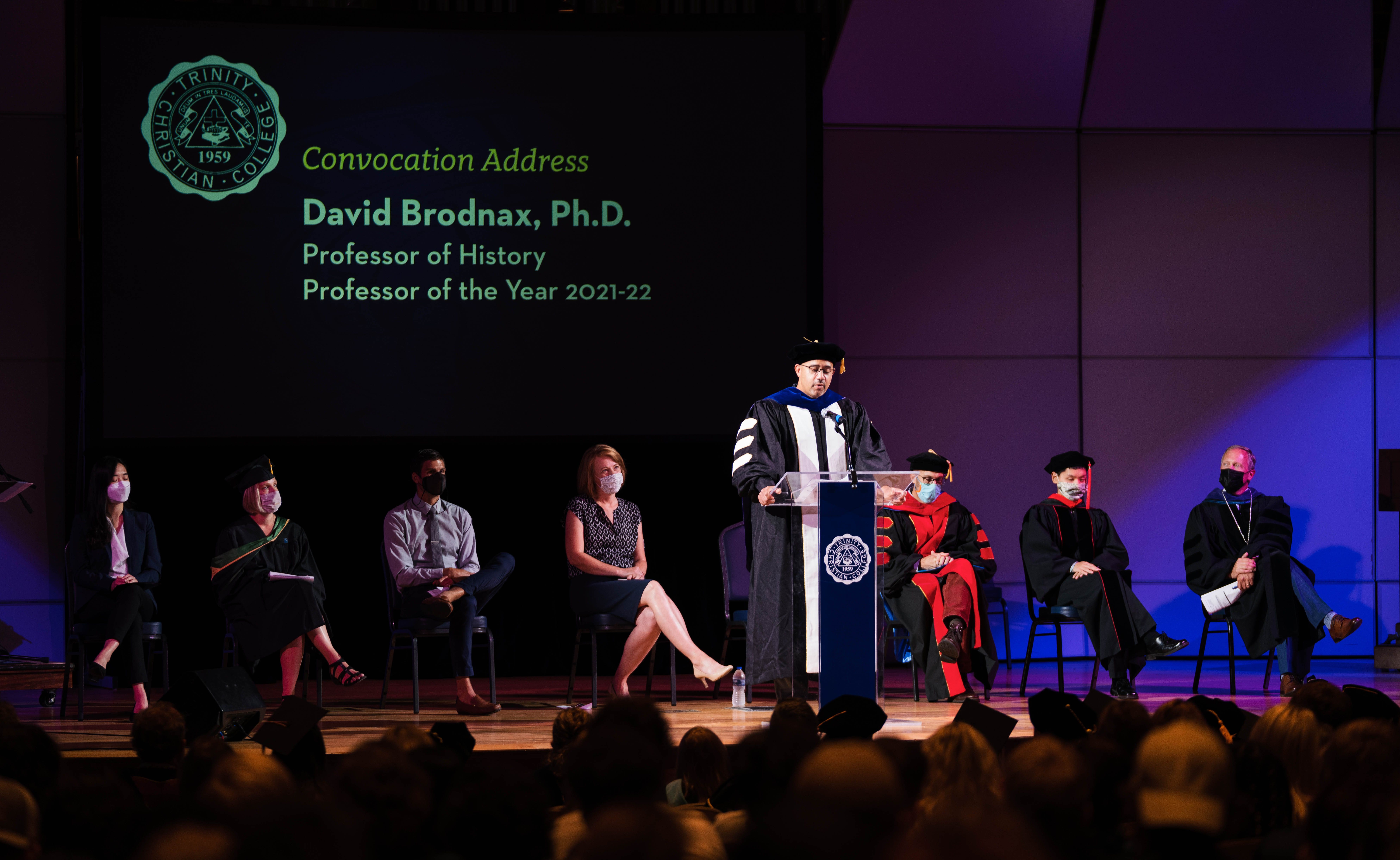 Professor of the year David Brodnax giving speech at Convocation