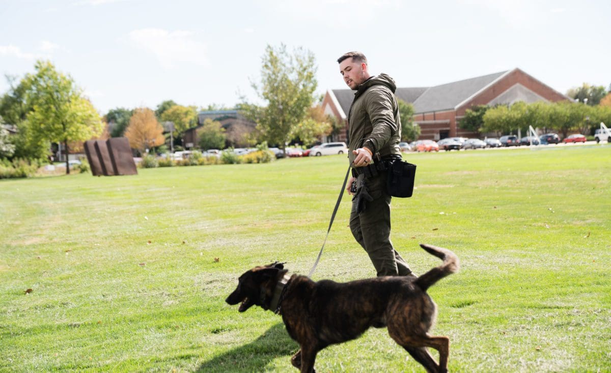 Alum Luke Weston visits campus with K9