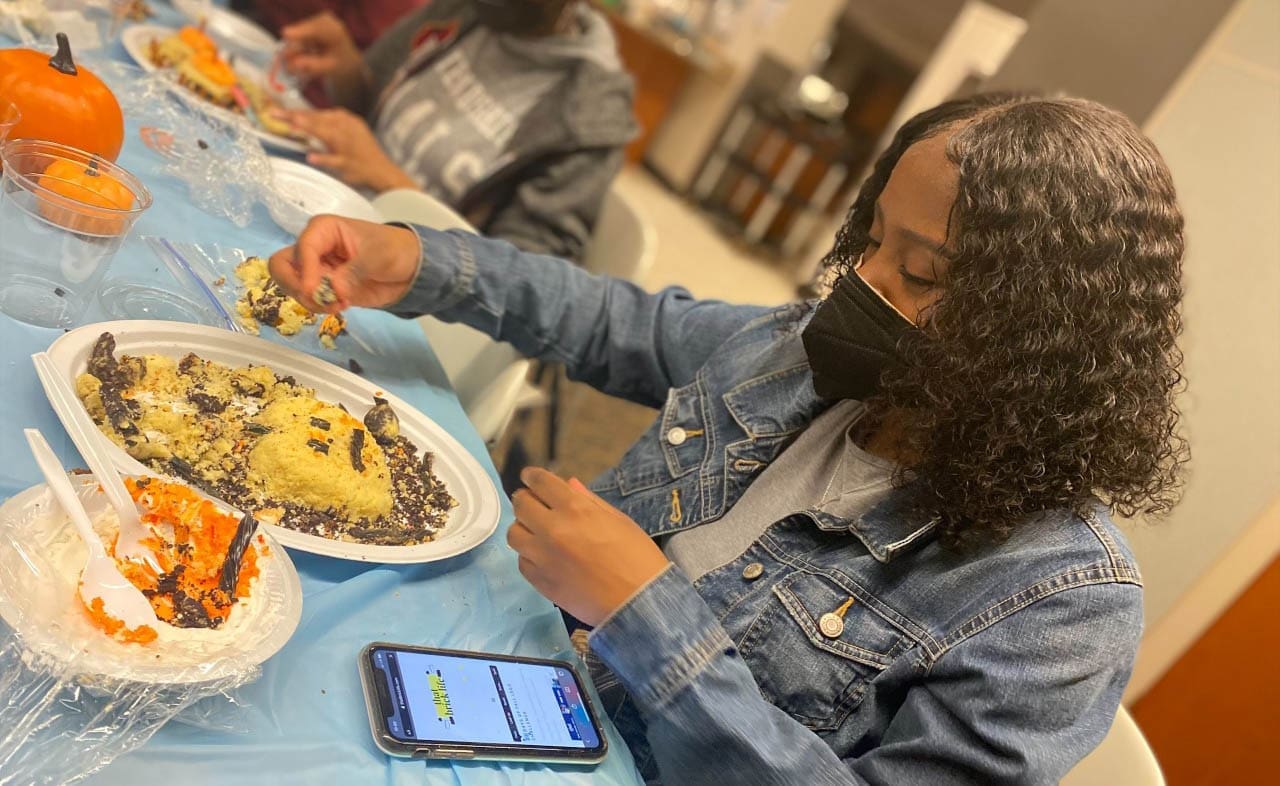 Students participating in food art