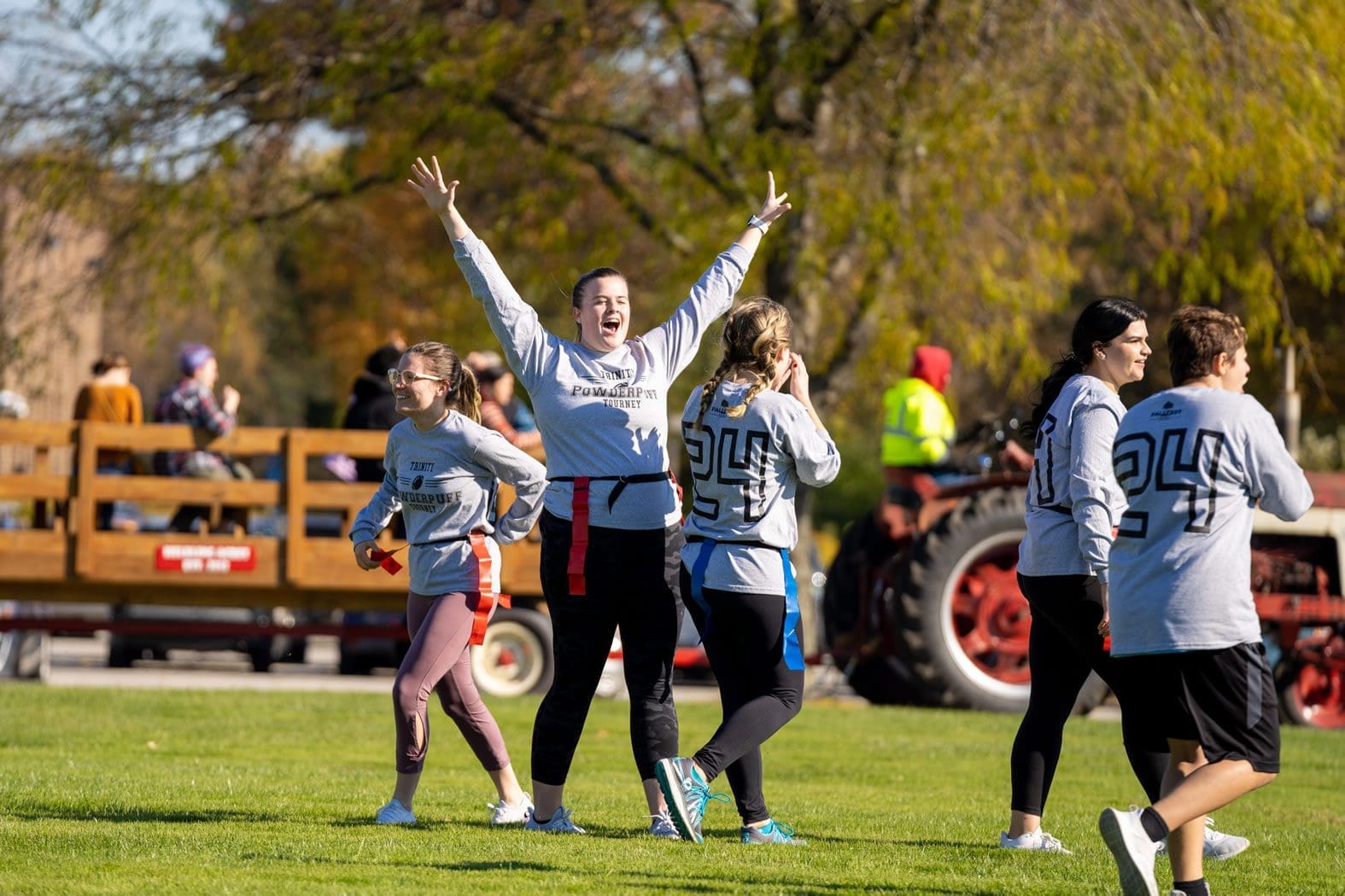 Fall Fest: Powder Puff Game - students playing flag football