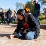 Fall Fest: Chalk the Walk - students drawing with chalk