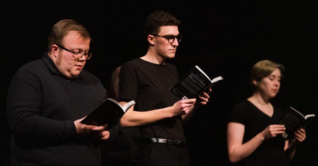 Students performing Holocaust reading