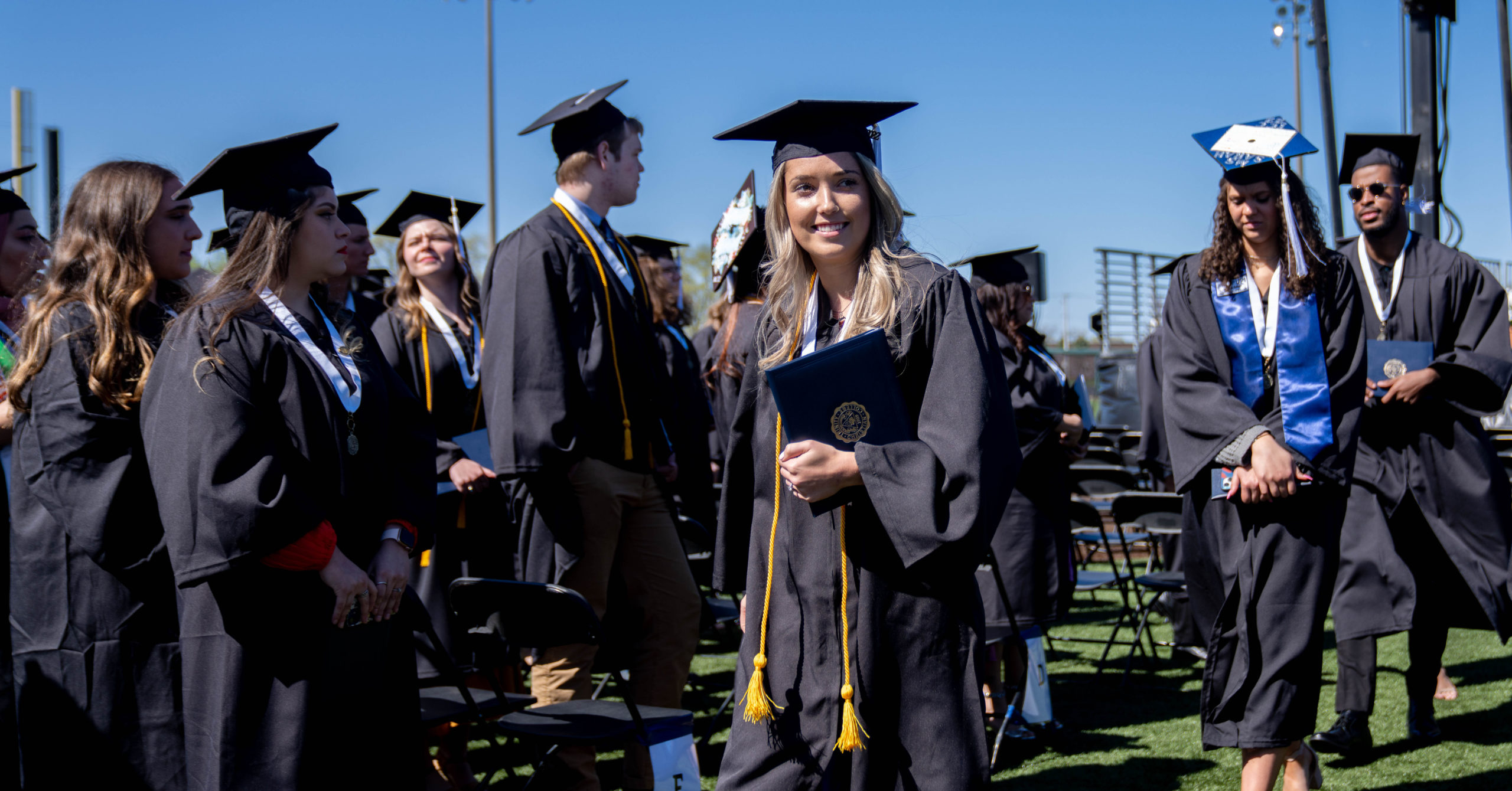 Commencement 2022 - students in their caps and gowns