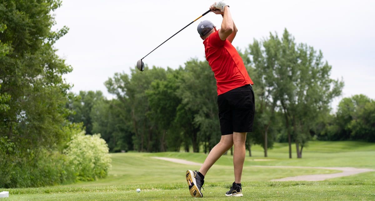 Alumni Golf Outing 2022 - driving off the tee box