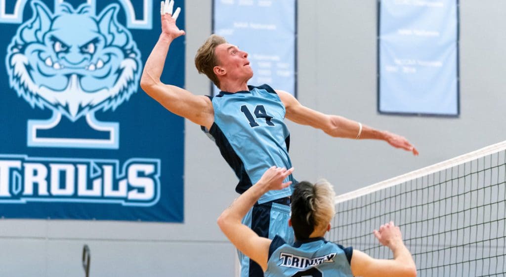 Mens Volleyball - player jumping up for spike