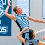 Mens Volleyball - player jumping up for spike