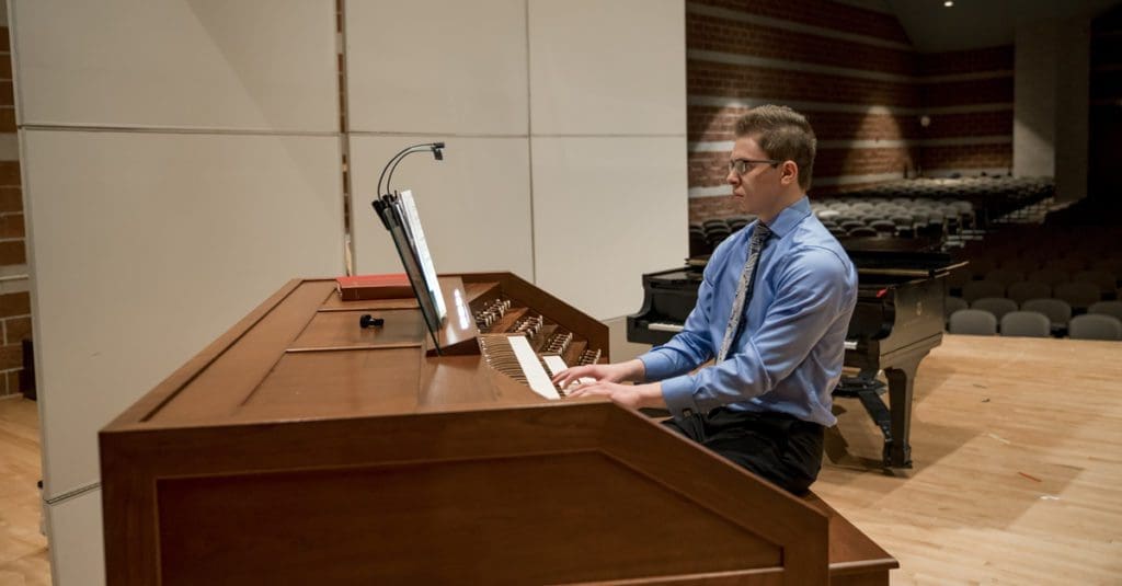 OPUS Recital - organ being played in the chapel auditorium