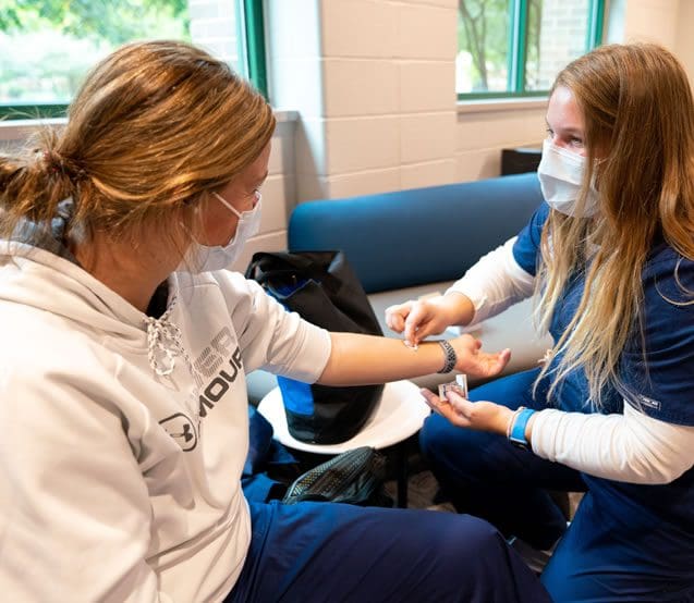 Nurse taking bloodpressure