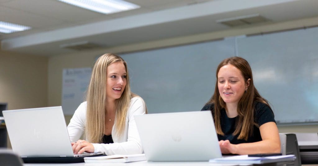 Finals Week - Second Semester: students conversing in class