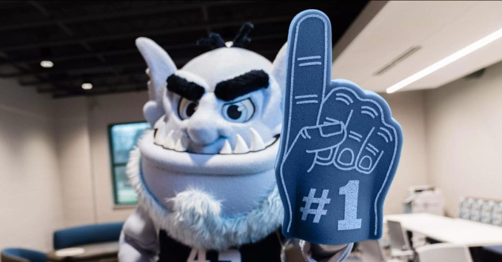 Healthy Troll Holding a Foam Finger