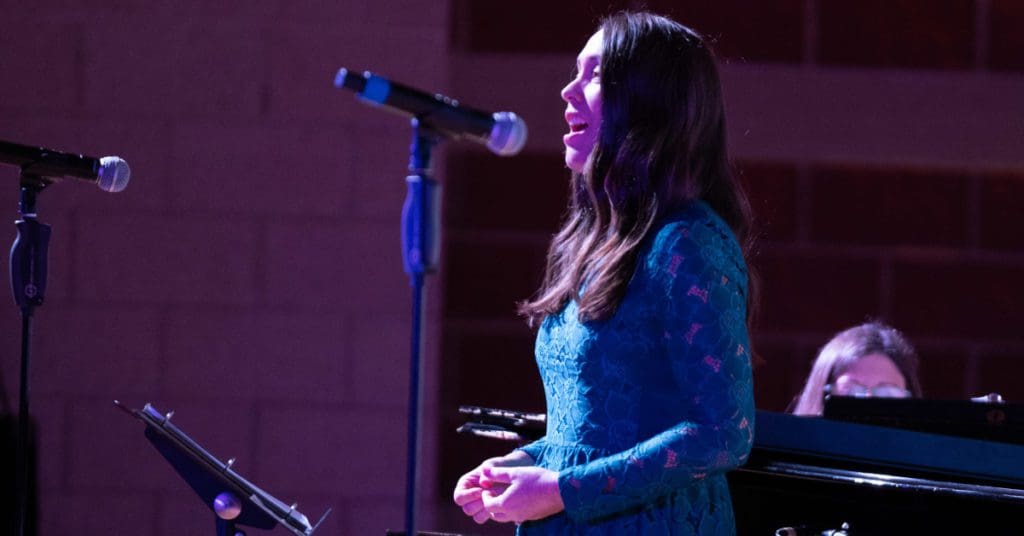 Toni Esker singing during recital